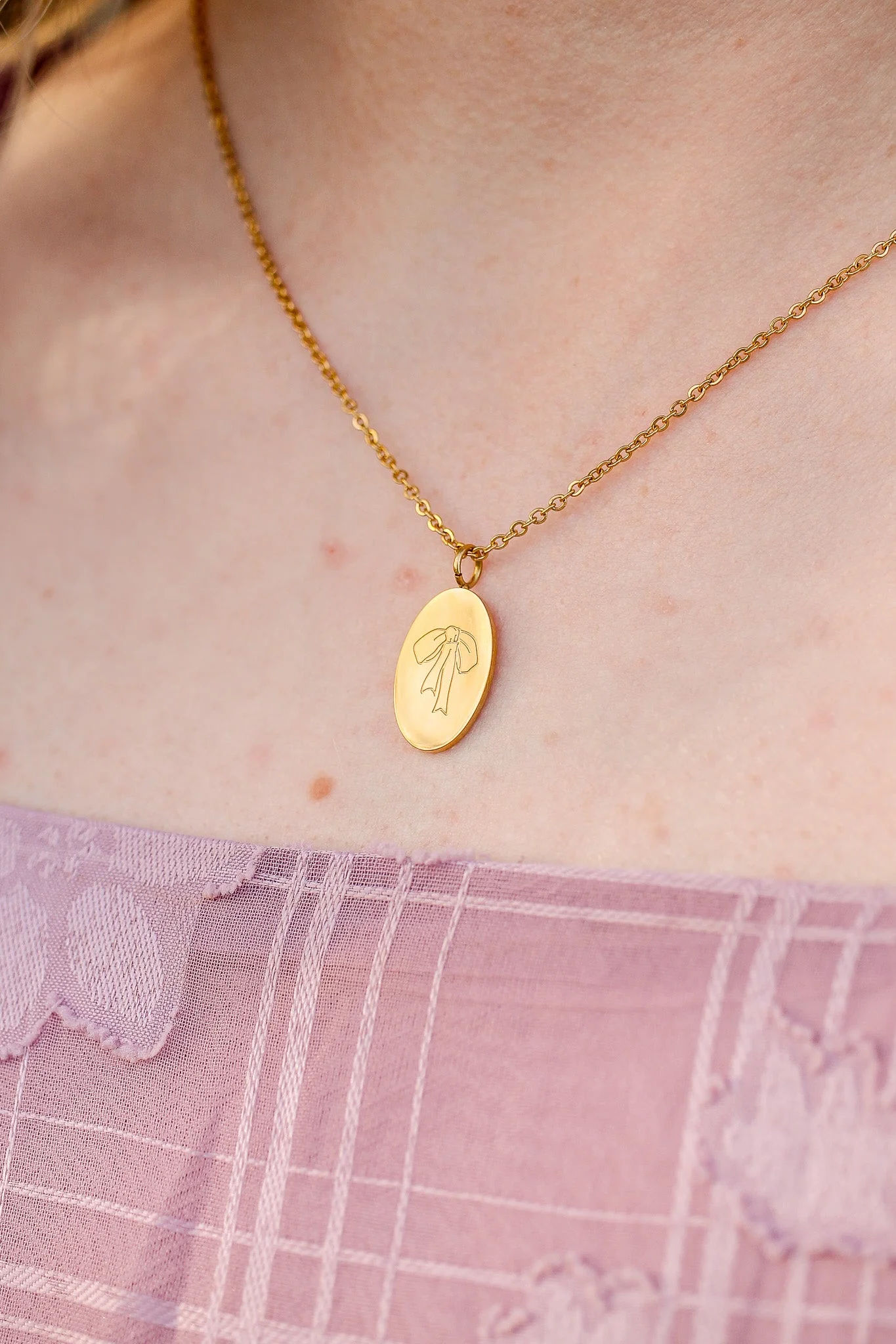 Bow Pendant Necklace in Gold - Image 8