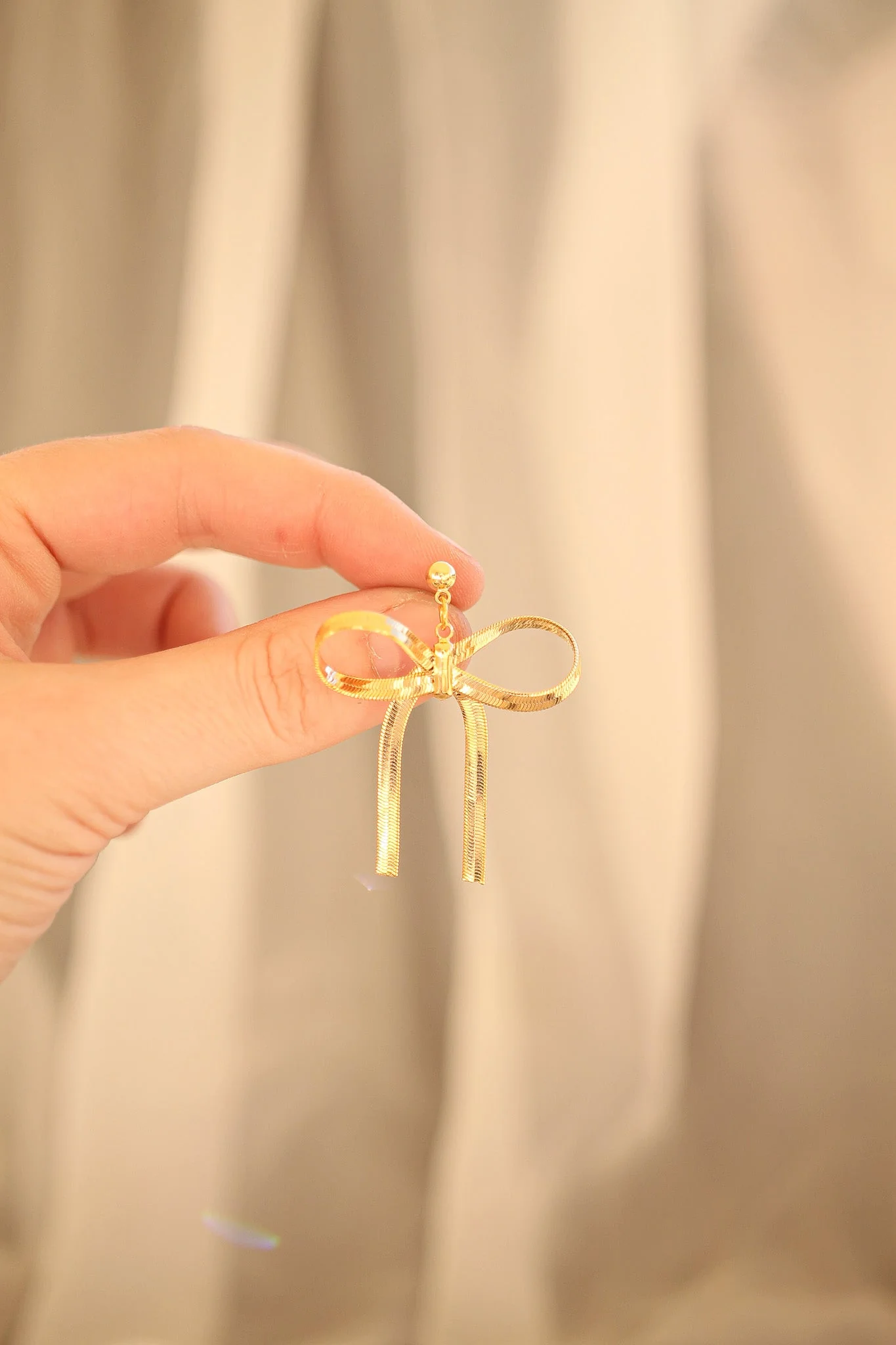 Lauren Bow Dangle in Gold - Image 9